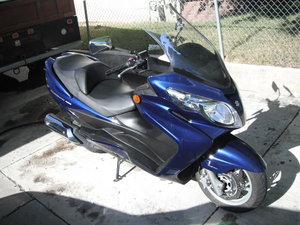 на фото это мой байк который продал.  Suzuki Burgman 400 (3576 просмотров) <a class='original' href='./download/file.php?id=40104&sid=67dba5bc630d98c0e74886fcbceecab1&mode=view' target=_blank>Загрузить оригинал (721.11 КБ)</a>